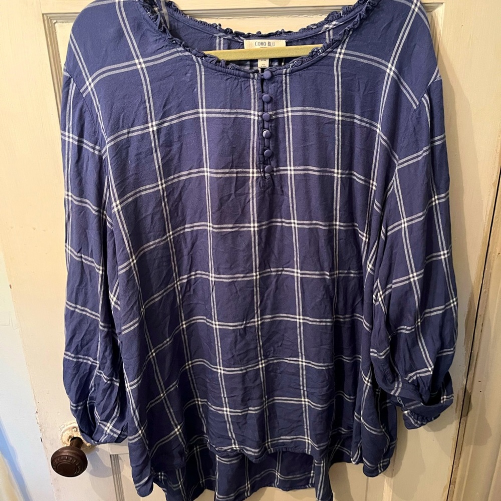 A blue plaid Como Blu plus size top with cuffed sleeves and ridged neck line.